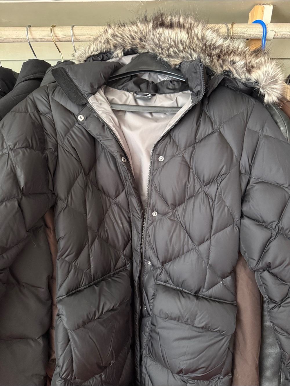 The North Face Black Quilted Puffer Coat with Faux Fur Trim
